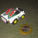 A Singapore dollar coin beside it to show how small these little buggers are.